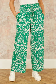 Pantalon femme satin imprimé Afrique vert